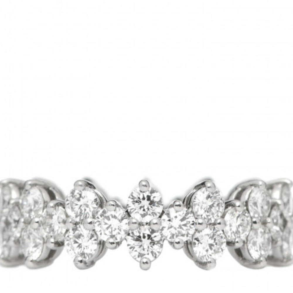 Tiffany Diamond and platinum eternity band size 7 1/4.